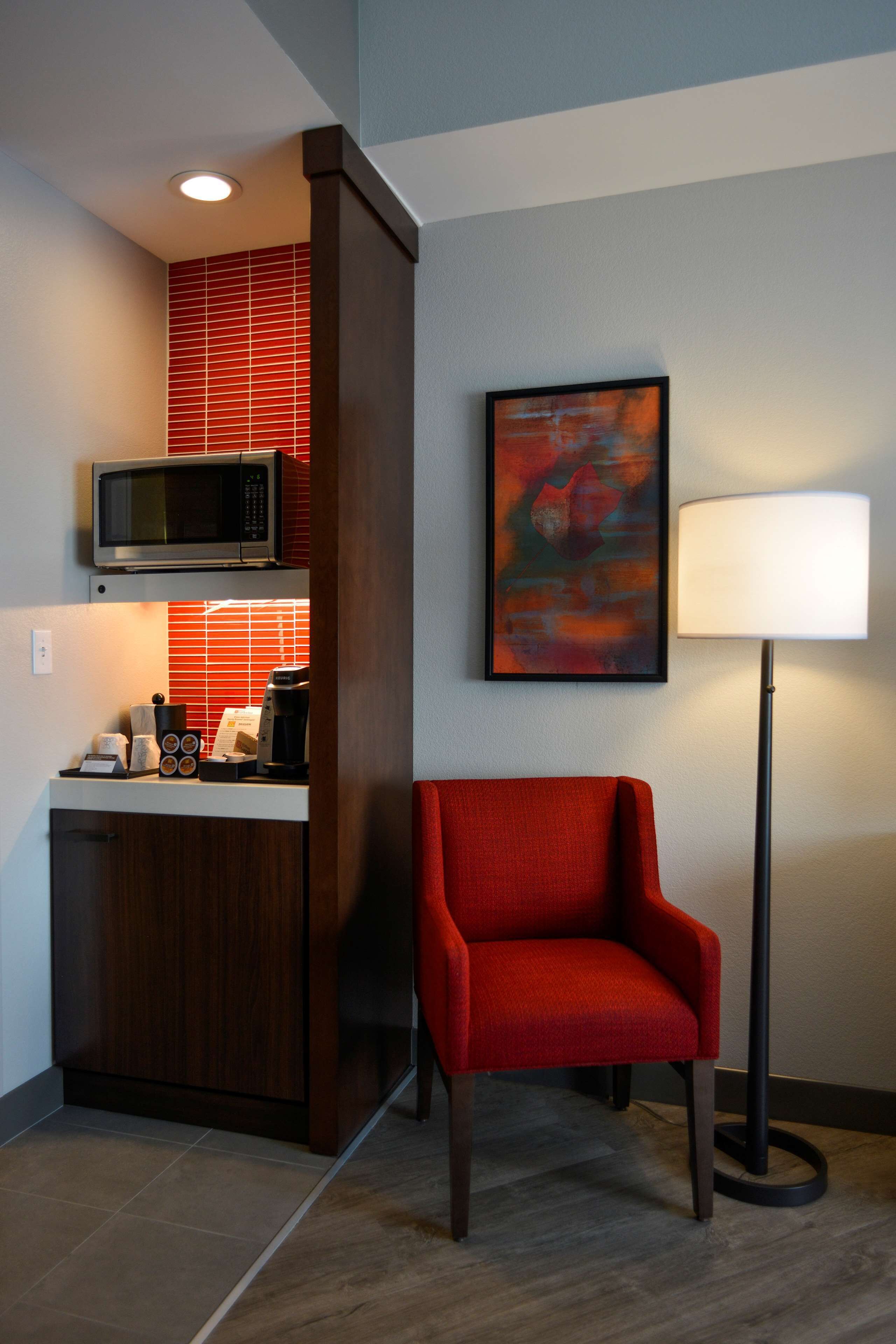 desk, laptop workspace, blackout curtains, iron/ironing board