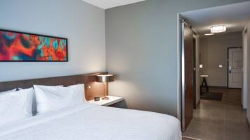 Desk, laptop workspace, blackout drapes, iron/ironing board