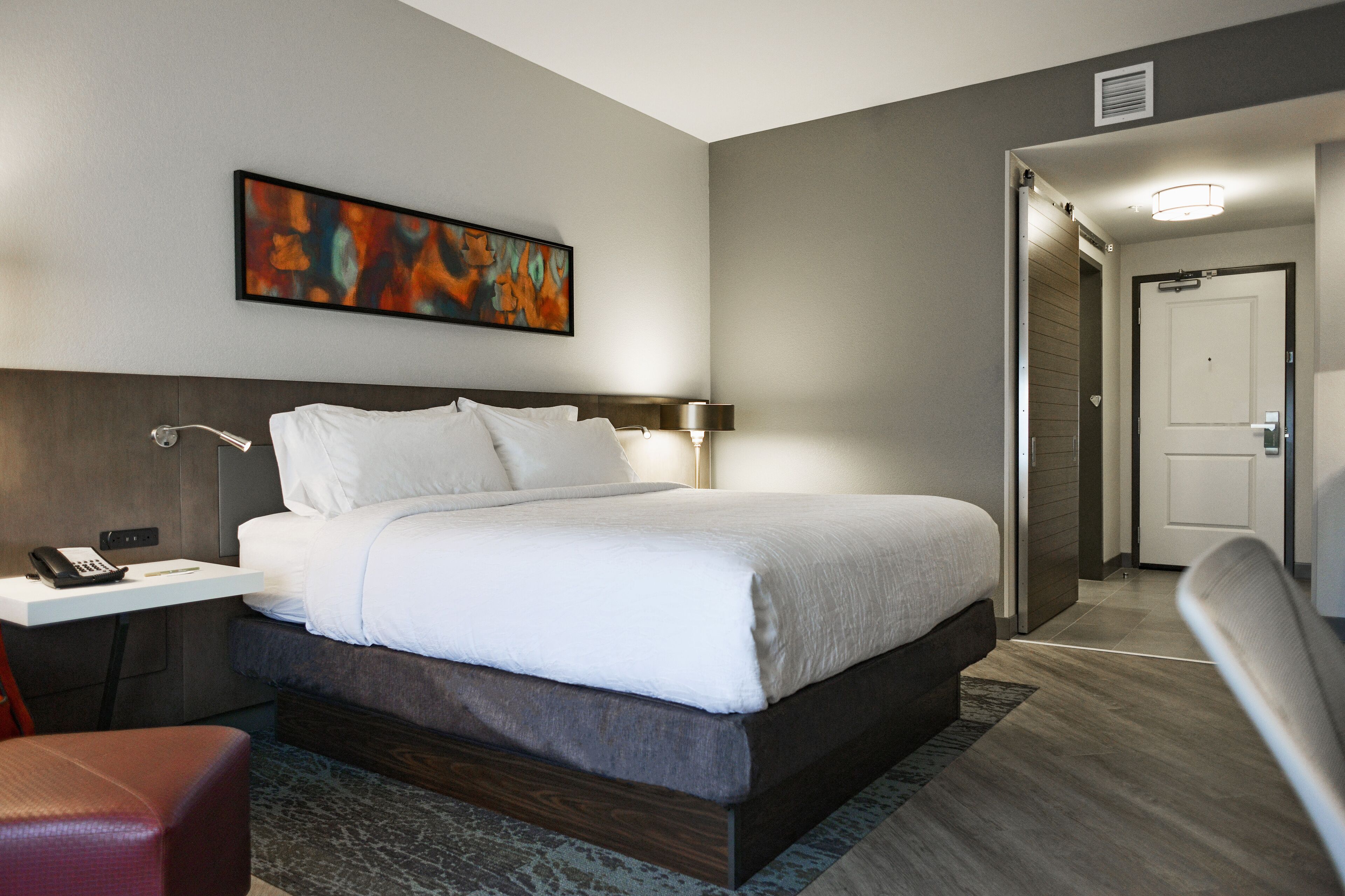 desk, laptop workspace, blackout curtains, iron/ironing board