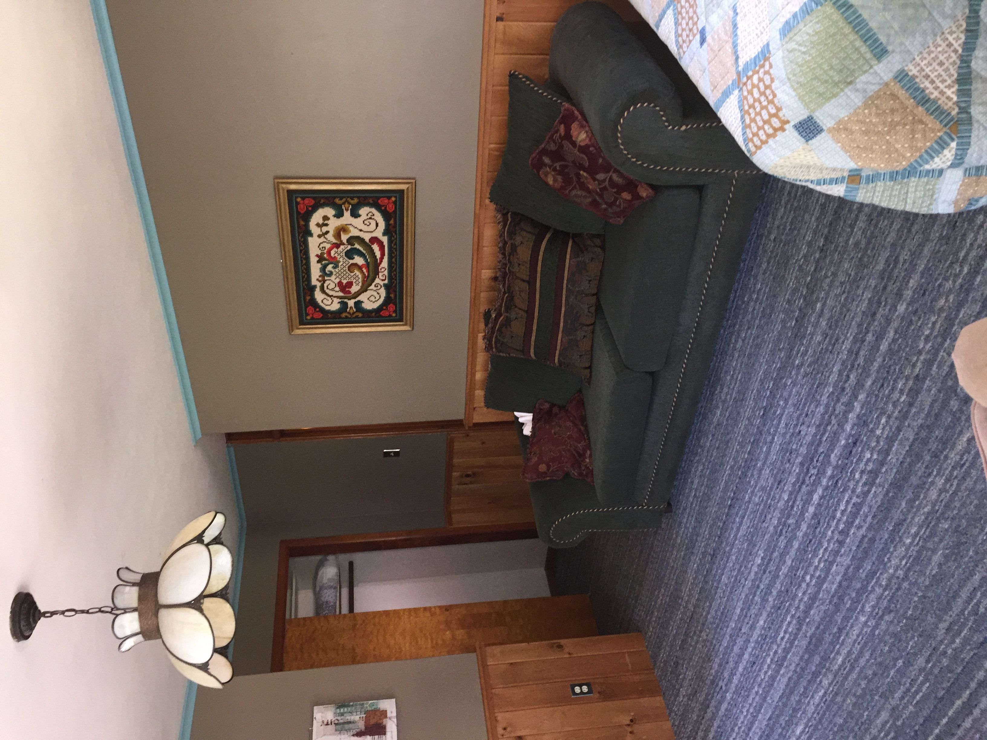 classic room, multiple beds | living area