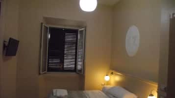 Standard Quadruple Room | Frette Italian sheets, Select Comfort beds, minibar, in-room safe