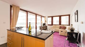 Apartment, 1 Bedroom | Living area | Flat-screen TV