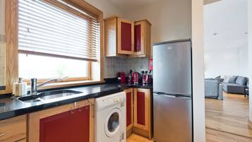 Apartment, 2 Bedrooms | Private kitchen | Full-sized fridge, microwave, oven, stovetop