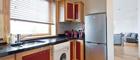 Apartment, 2 Bedrooms | Private kitchen | Full-size fridge, microwave, oven, stovetop