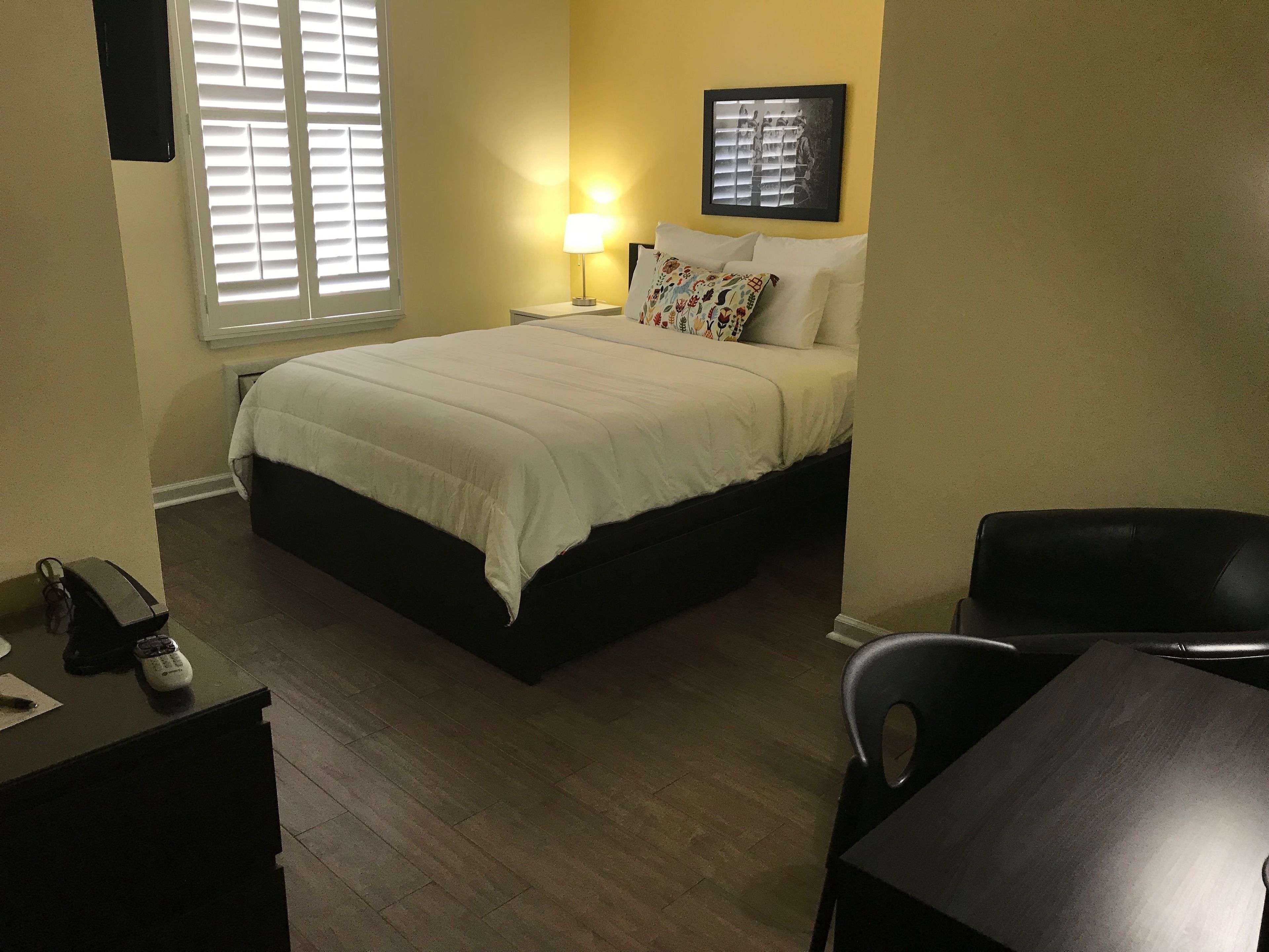 signature room, 1 queen bed | in-room safe, desk, iron/ironing board, free wifi