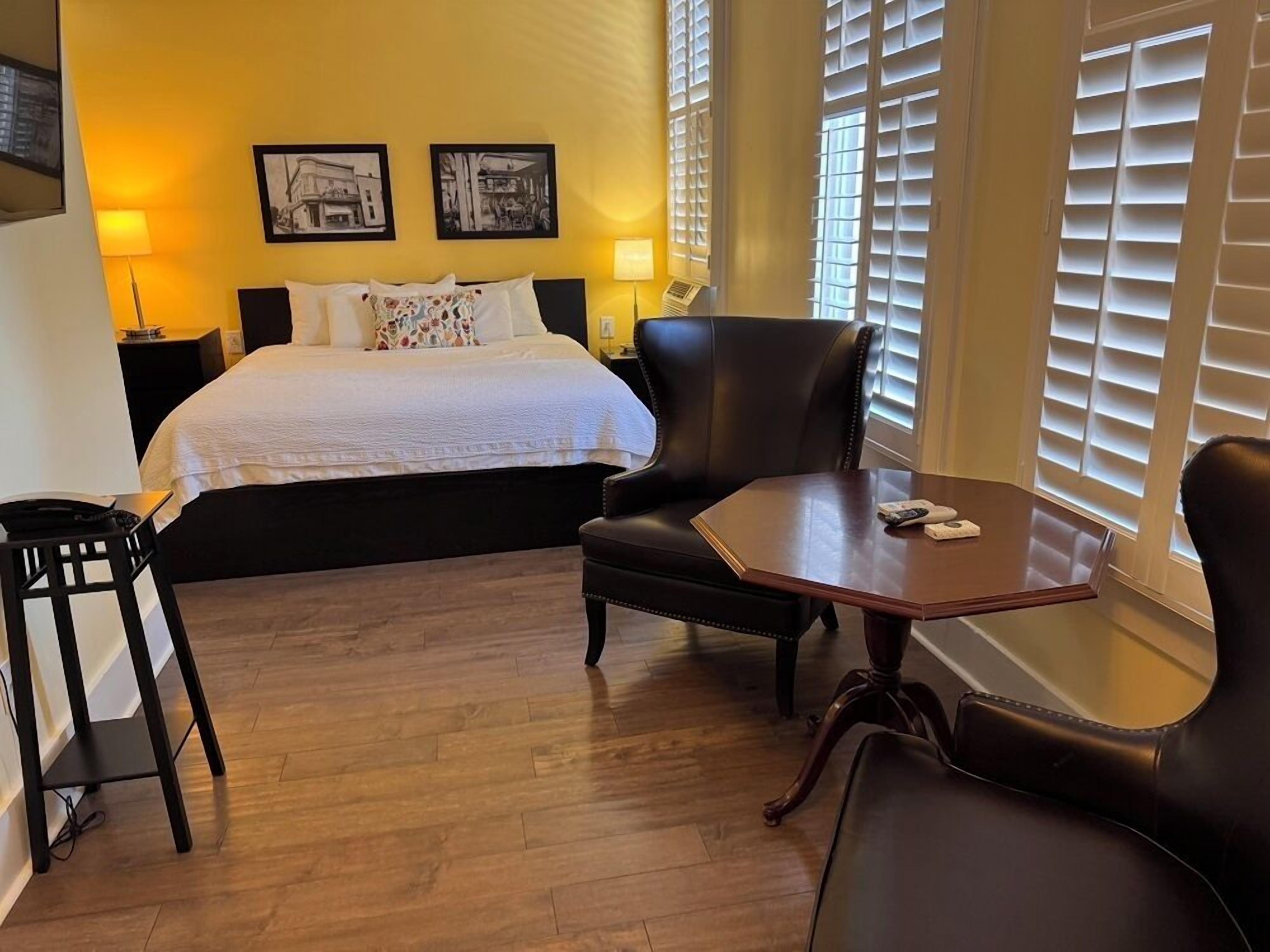 signature room, 1 king bed | in-room safe, desk, iron/ironing board, free wifi