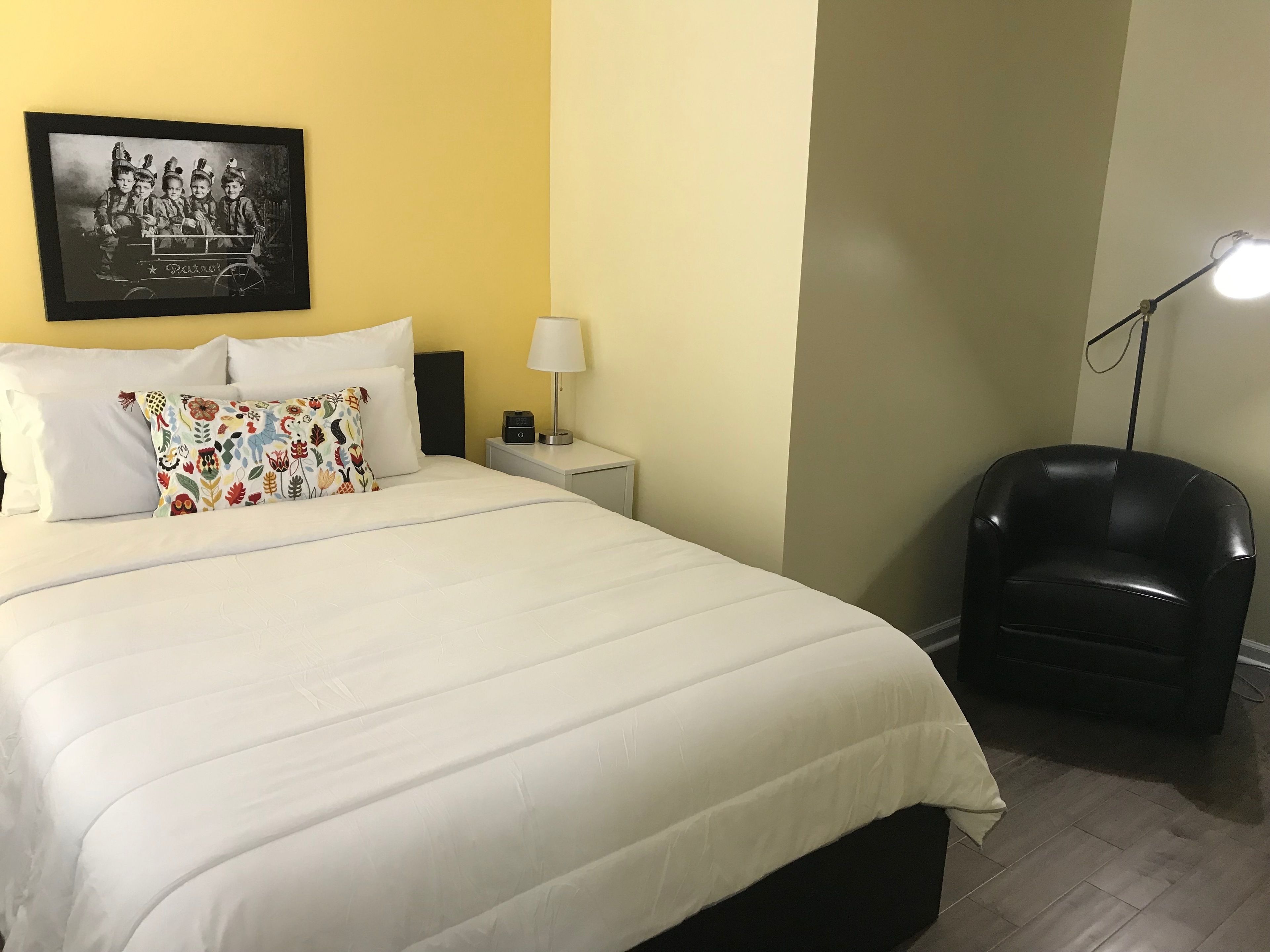 signature room, 1 queen bed | in-room safe, desk, iron/ironing board, free wifi