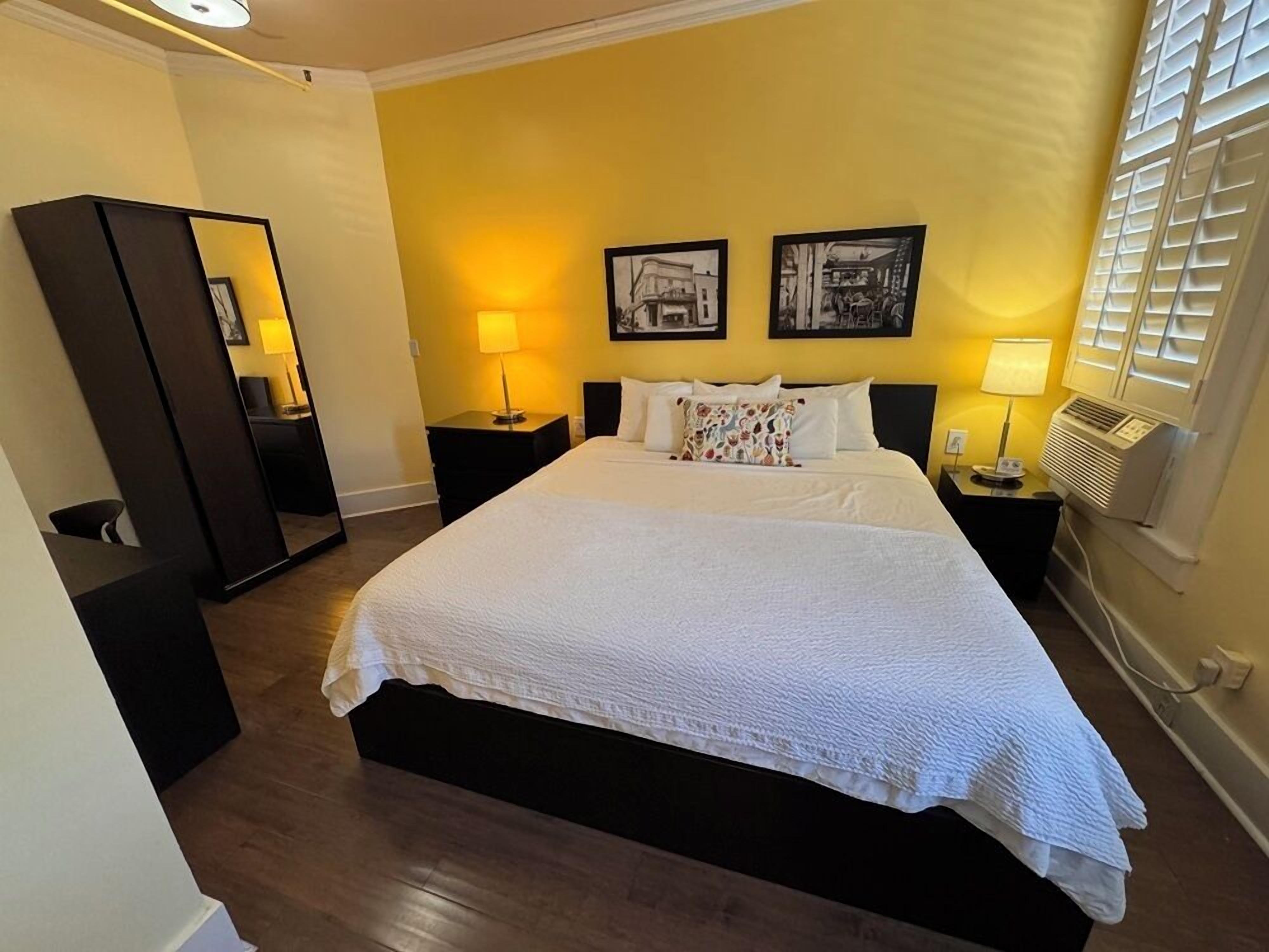 signature room, 1 king bed | in-room safe, desk, iron/ironing board, free wifi