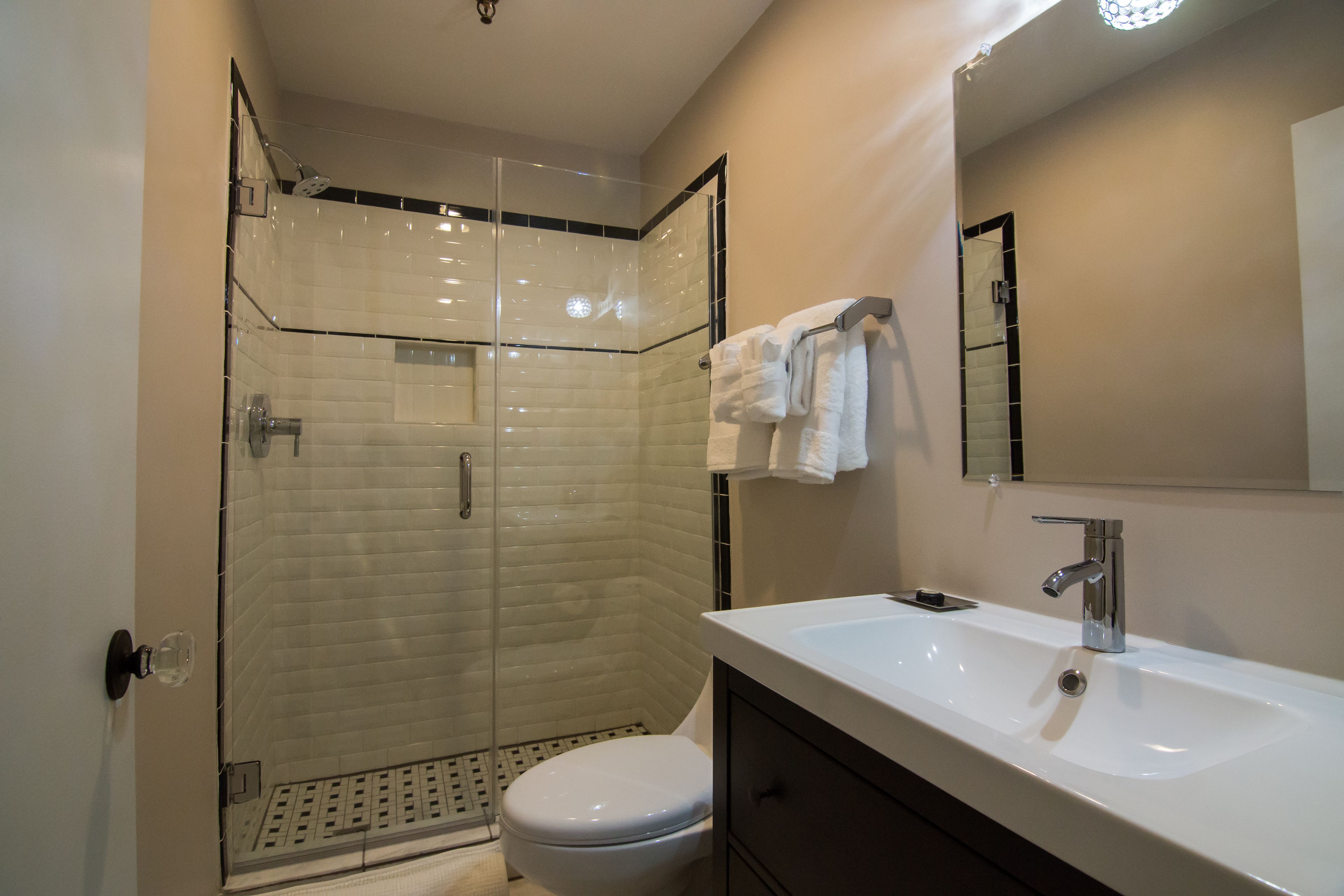 signature room, 1 king bed | bathroom | shower, free toiletries, hair dryer, towels