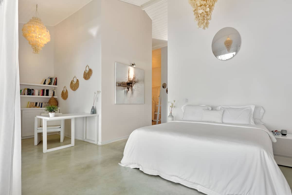 Suite Deluxe | Minibar, caja fuerte, cortinas opacas y sistema de insonorización