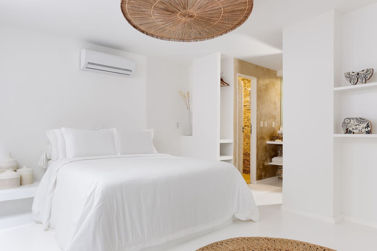 Suite familiare, patio, al piano terra | 1 camera, minibar, una cassaforte in camera, con stile personalizzato