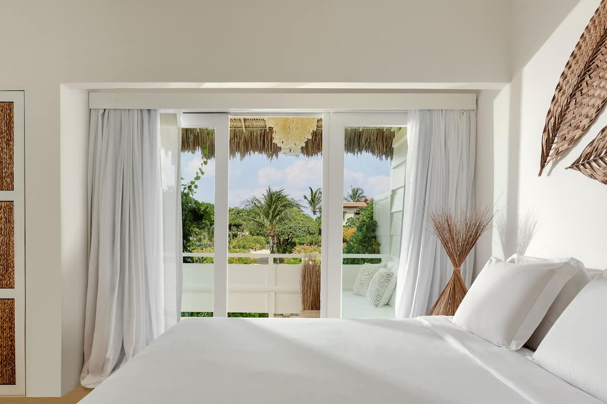 Suite junior, 1 cama de matrimonio, patio, vistas al jardín | Vistas desde la habitación