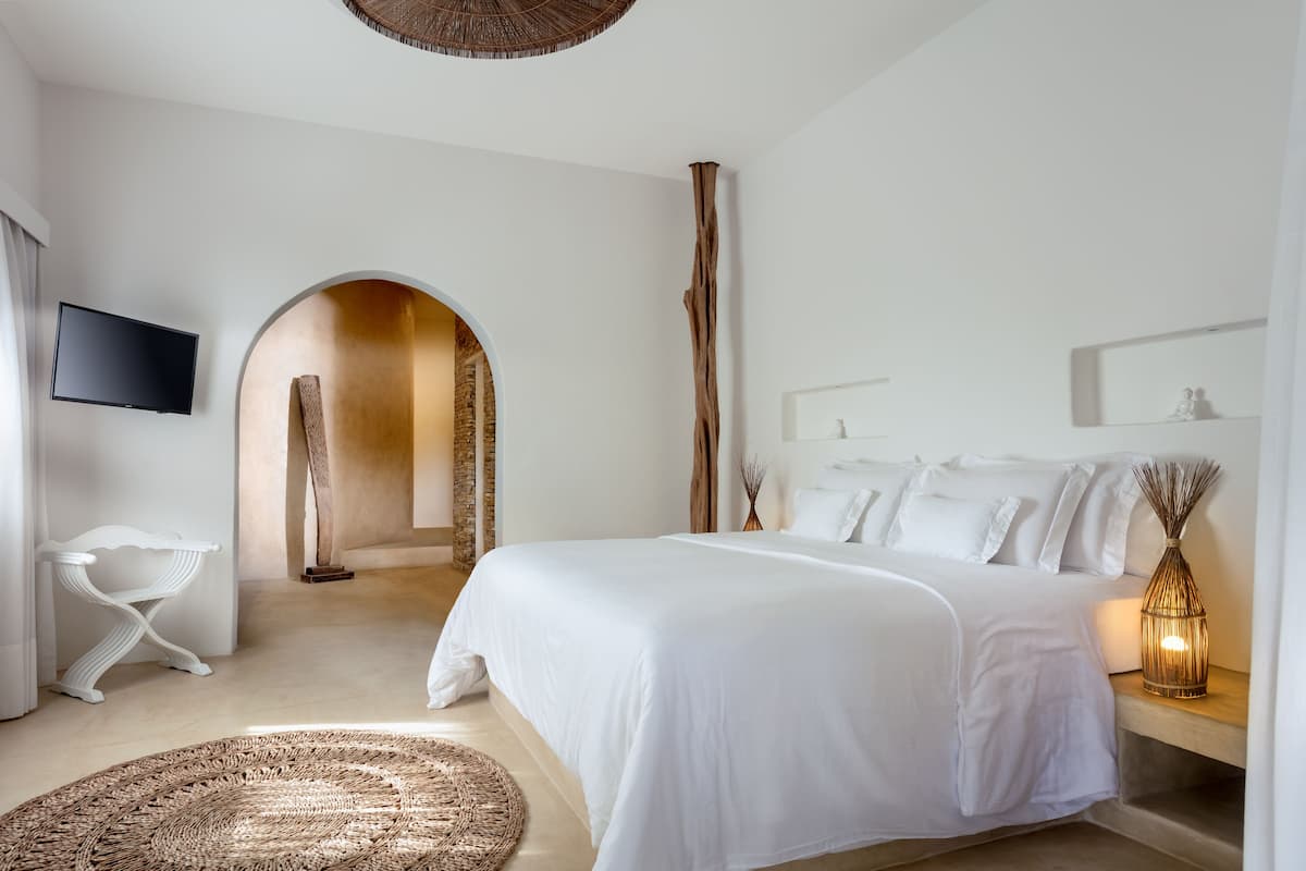 Suite Deluxe | Minibar, caja fuerte, cortinas opacas y sistema de insonorización
