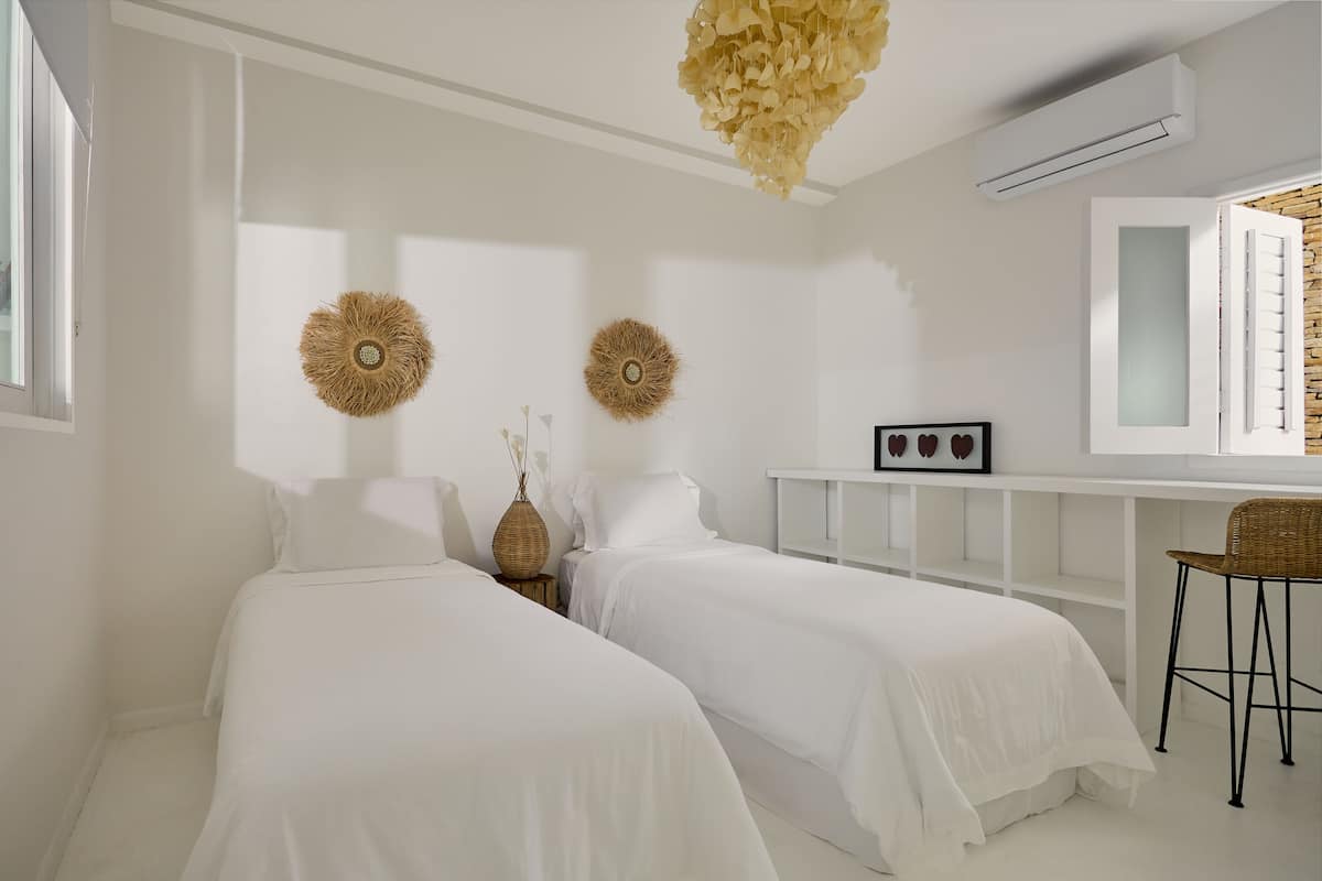 Villa familiar | Minibar, caja fuerte, cortinas opacas y sistema de insonorización