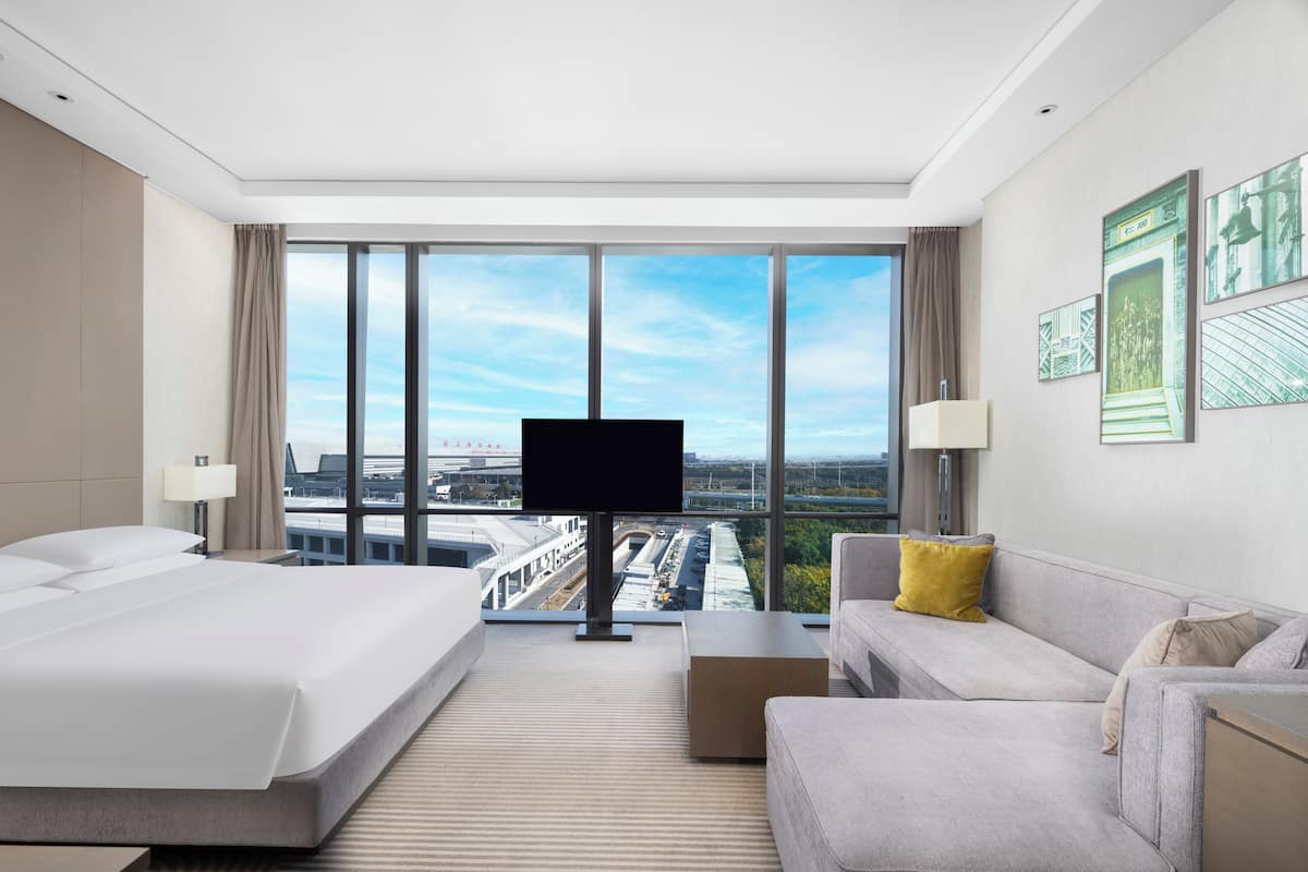 room, 1 king bed with kitchen (hongqiao) | premium bedding, down duvets, in-room safe, individually decorated