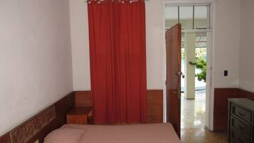 Basic Double Room, Shared Bathroom | In-room safe, desk, free WiFi, bed sheets