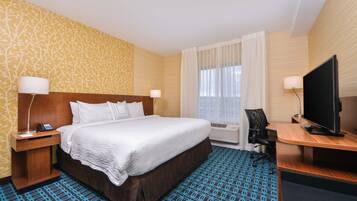 Ropa de cama de alta calidad, caja fuerte, escritorio y cortinas opacas