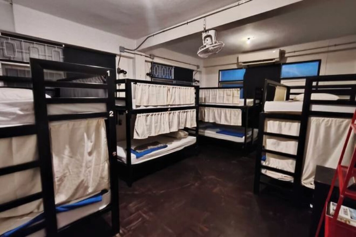 Bed In Male Dormitory Room For 10 People
