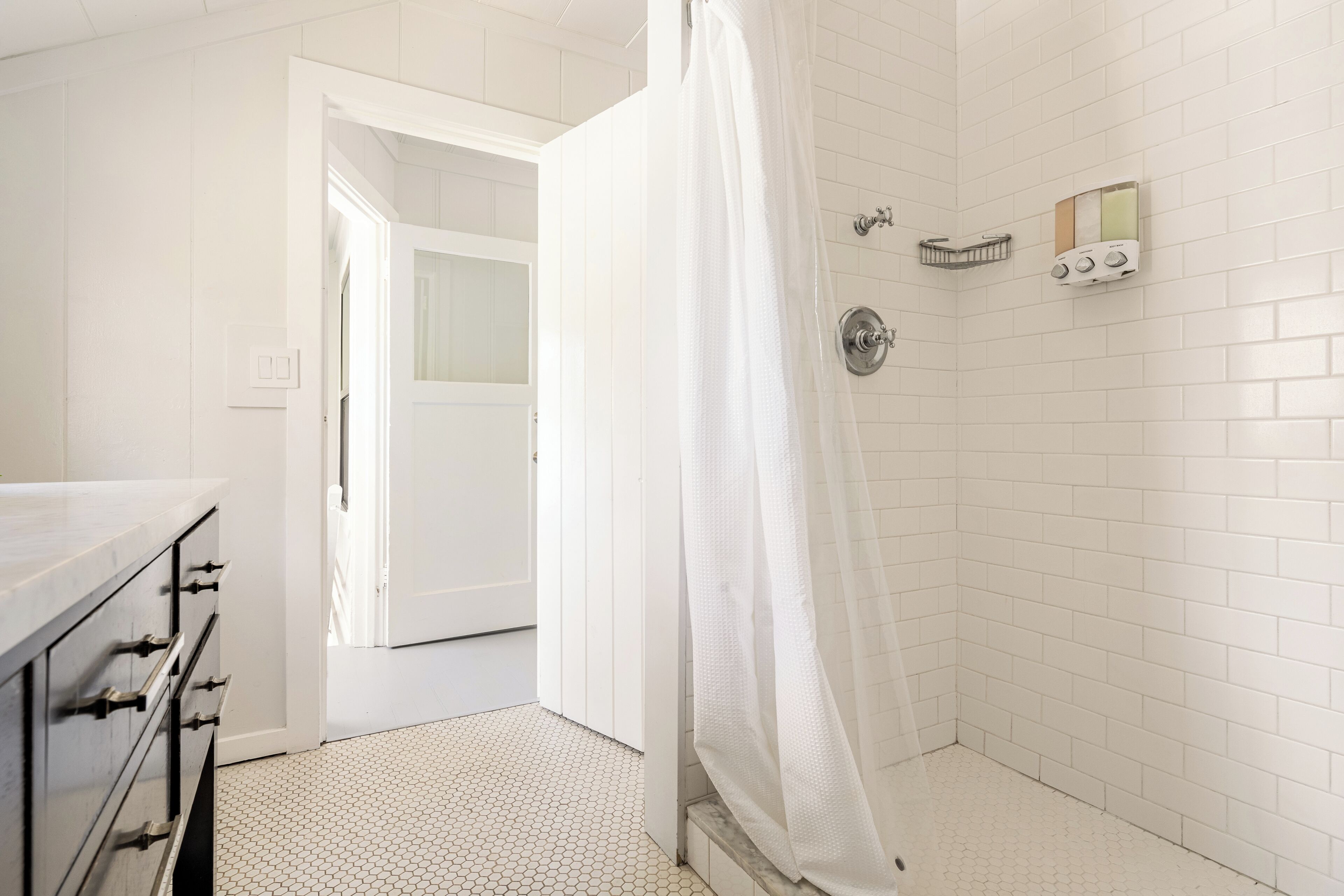Bathtub, eco-friendly toiletries, hair dryer, towels