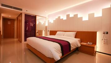 Kamar Double Deluks | Minibar, brankas, tempat tidur lipat/tambahan, dan Wi-Fi gratis