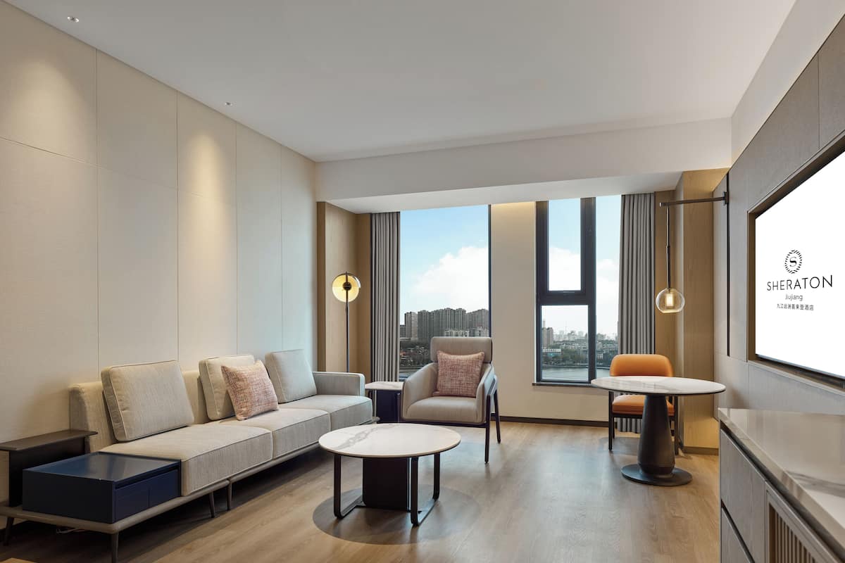 Executive Suite, 1 King Bed, Lake View | Living room | LCD TV