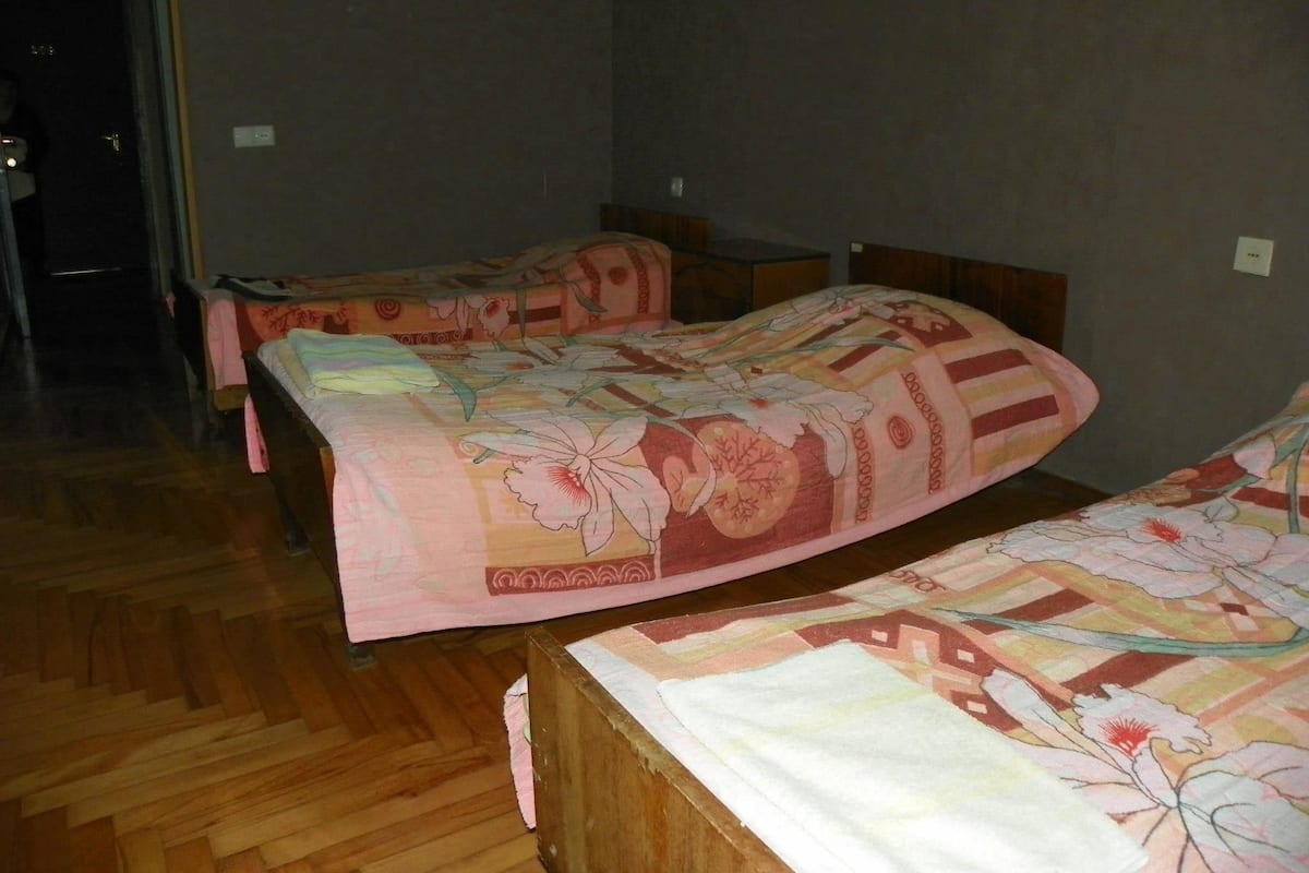 Standard Quadruple Room, City View | Premium bedding