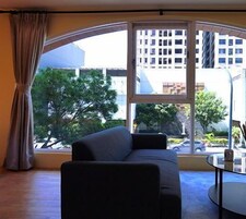 Family Quadruple Room, 2 Double Beds, Kitchen, City View | Living area | LCD TV