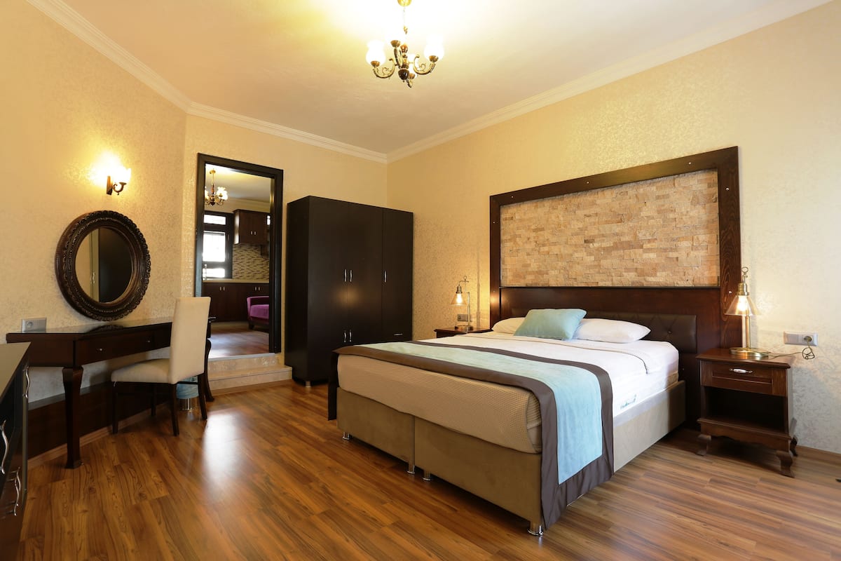 Family Studio, Non Smoking, Garden View | 1 bedroom, individually decorated, individually furnished, desk