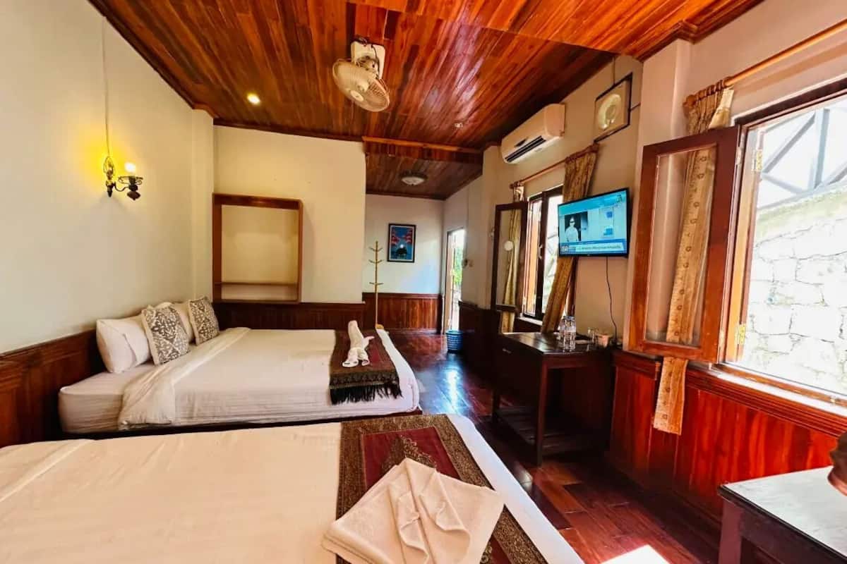 Camera familiare con 2 letti singoli | Wi-Fi gratuito