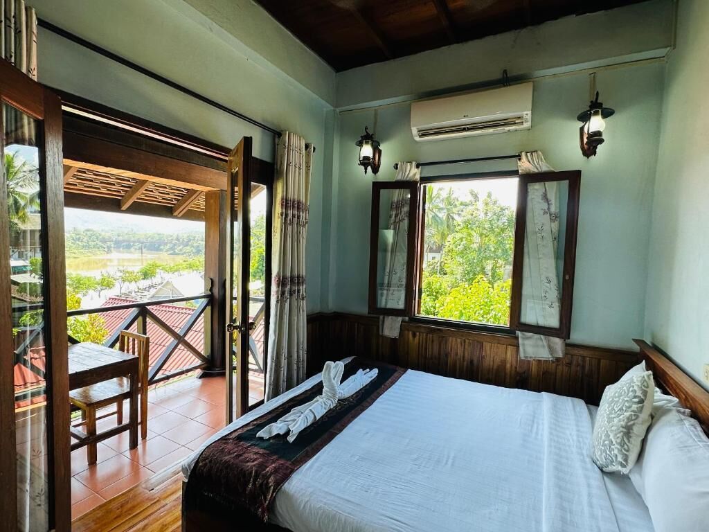 Deluxe Room, River View | Terrace/patio