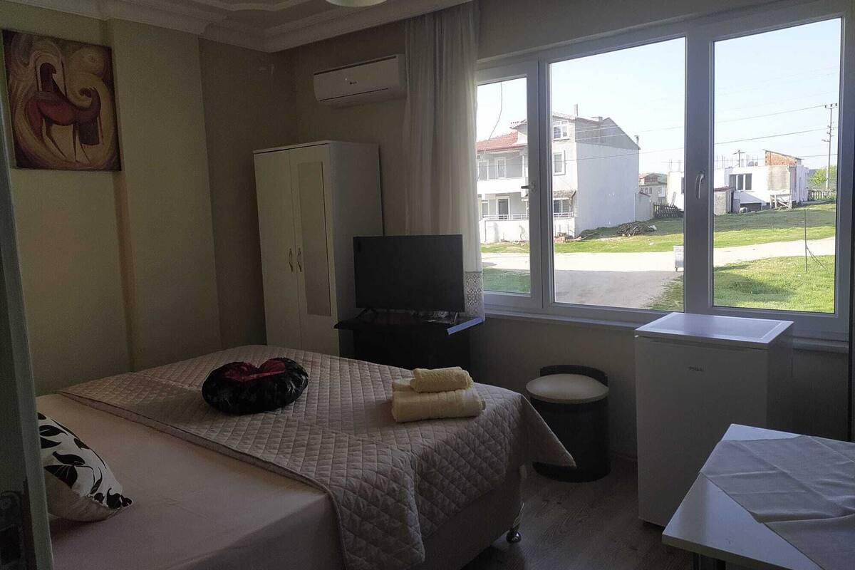 Premium bedding, desk, laptop workspace, free WiFi