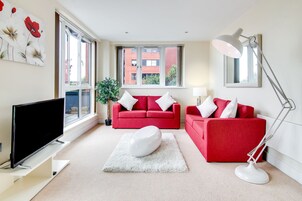 Apartment, 2 Bedrooms | Living room | Flat-screen TV, pay movies