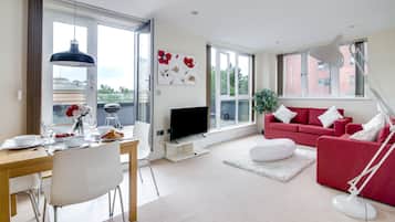 Apartment, 2 Bedrooms | Living area | Flat-screen TV, pay movies