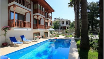 Outdoor pool, pool umbrellas, sun loungers