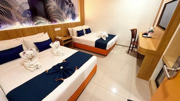 Select Comfort beds, minibar, desk, laptop workspace