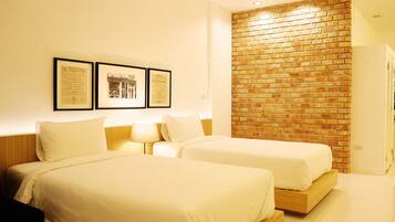Chambre Deluxe Double ou avec lits jumeaux | Minibar, bureau, lits pliants/supplémentaires, Wi-Fi gratuit