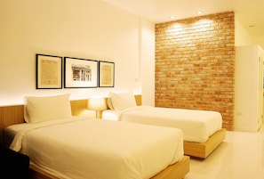 Chambre Deluxe Double ou avec lits jumeaux | Minibar, bureau, lits pliants/supplémentaires, Wi-Fi gratuit
