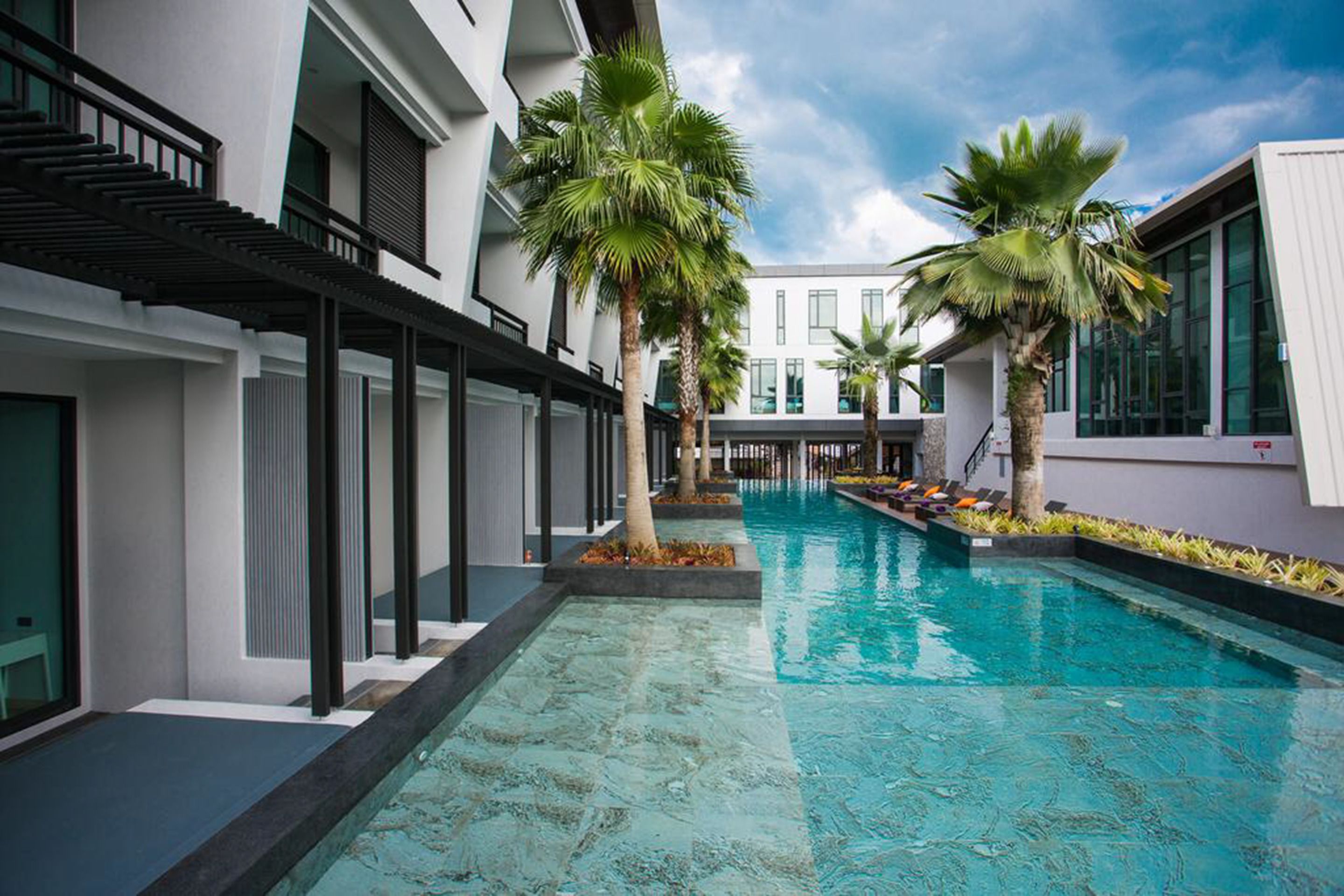 outdoor pool, pool umbrellas, pool loungers