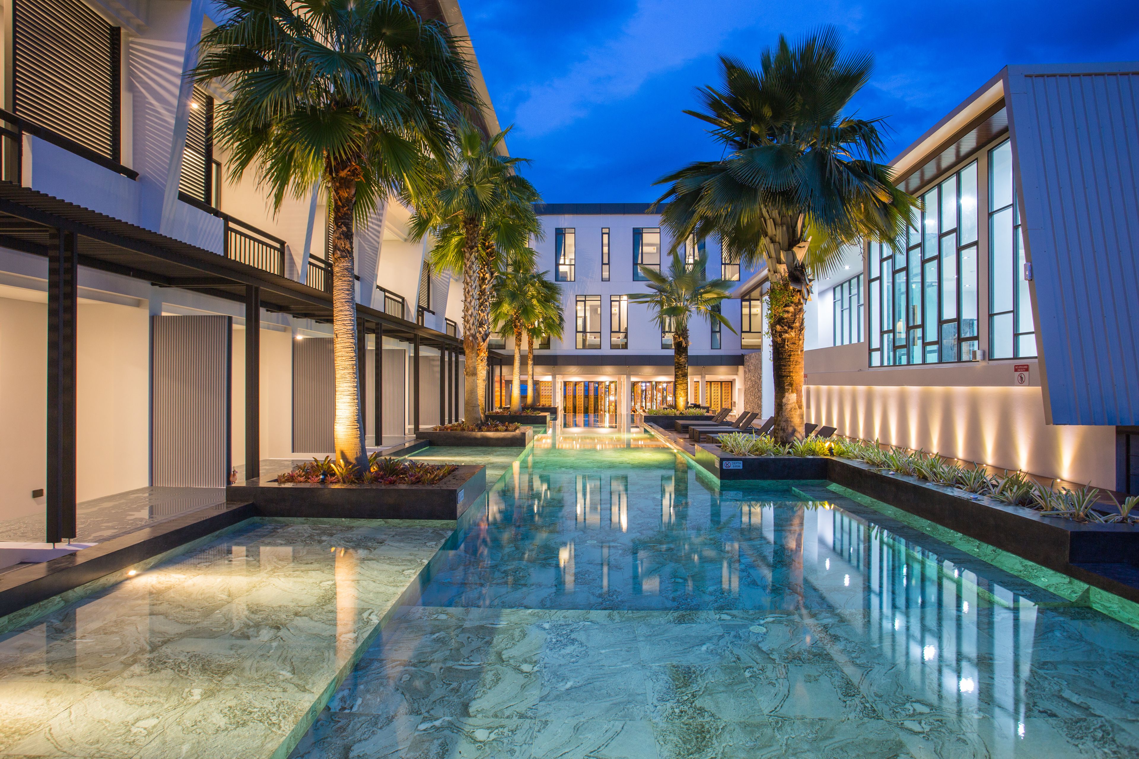 outdoor pool, pool umbrellas, pool loungers