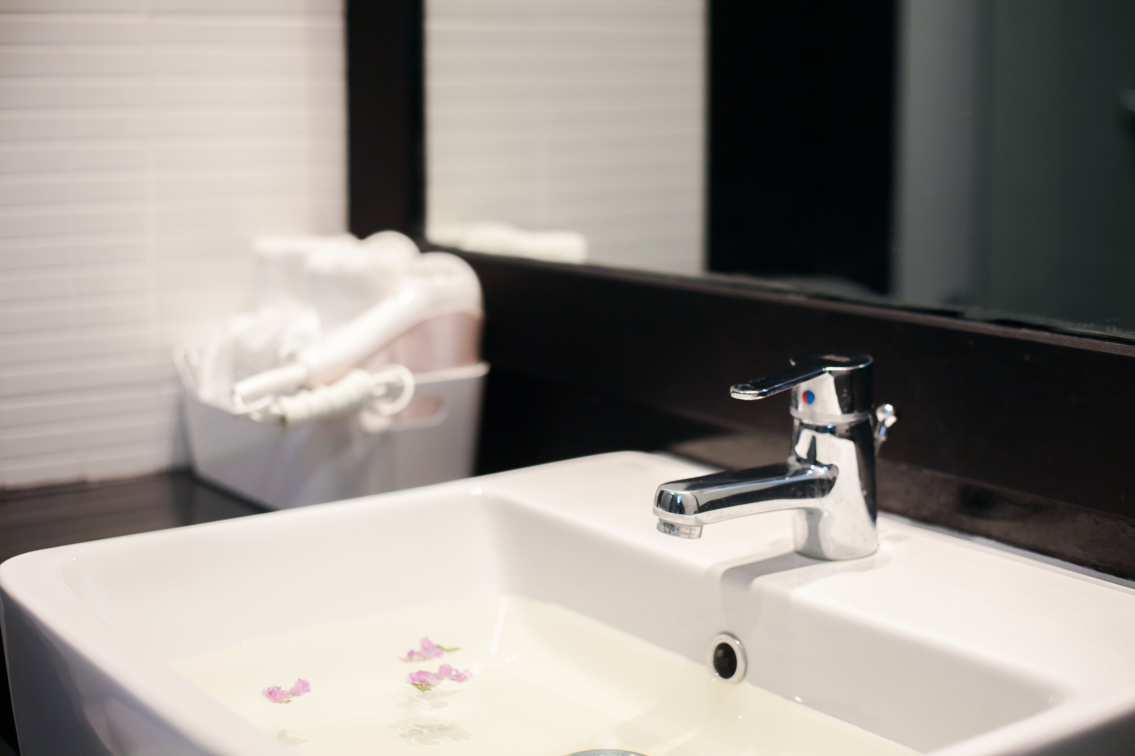 deluxe room with pool access | bathroom sink