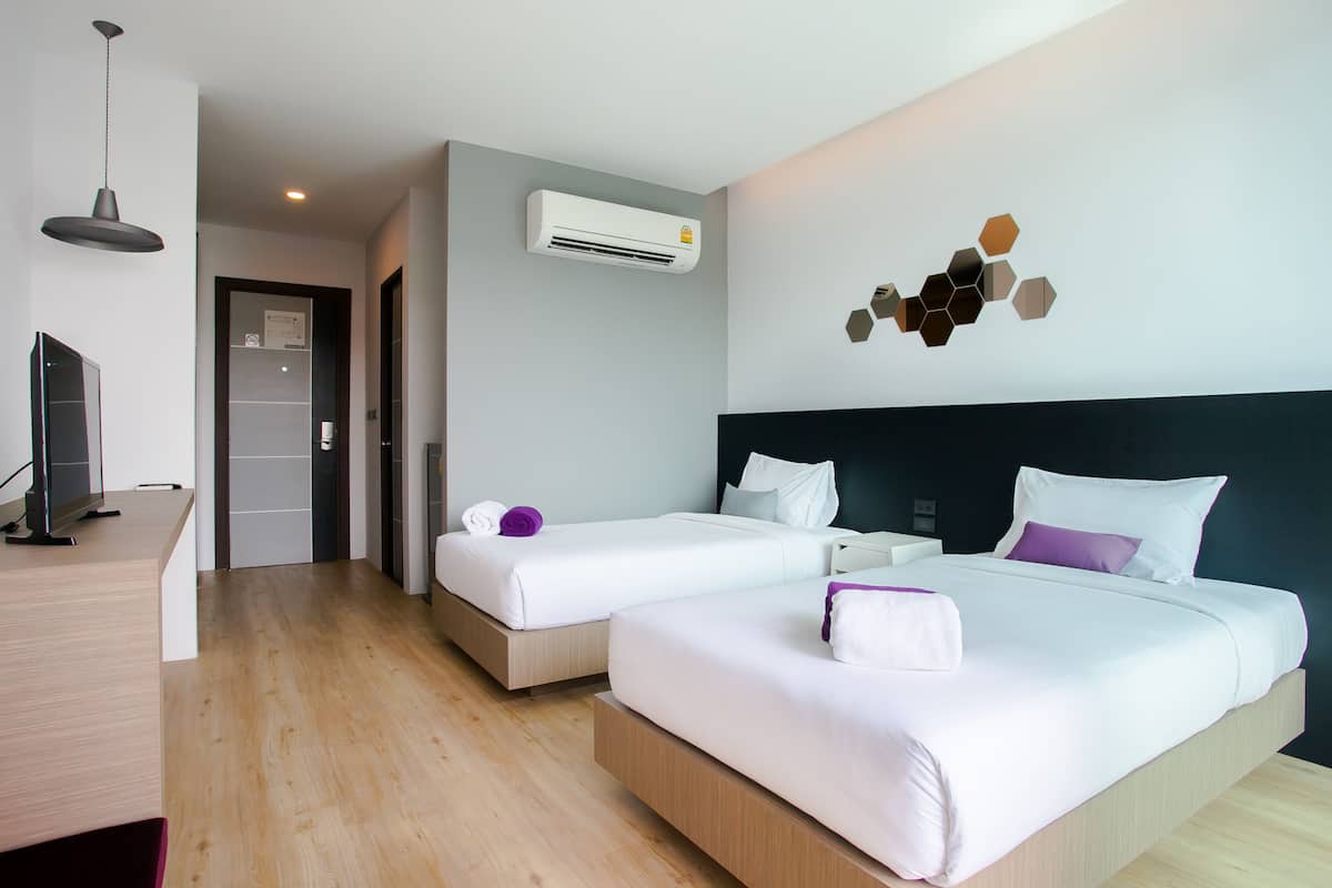 Deluxe Twin Room, 2 Twin Beds, Non Smoking, Pool View | Minibar, in-room safe, blackout drapes, free WiFi