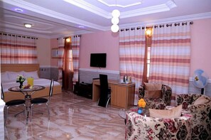Suite Grand | Area keluarga | TV plasma