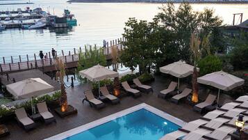 Outdoor pool, pool umbrellas, pool loungers