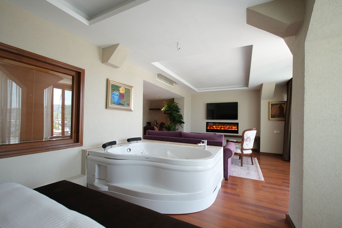 Suite Premium, terrasse, vue mer | Draps en coton égyptien, literie de qualité supérieure, minibar