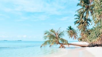 Private beach nearby, white sand, sun loungers, beach towels