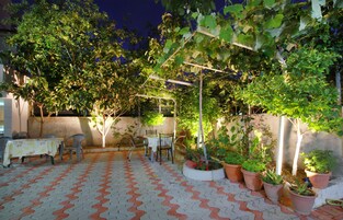 Standard-huoneisto, 2 makuuhuonetta, näköala puutarhaan, puutarha-alue | Näkymä puutarhaan