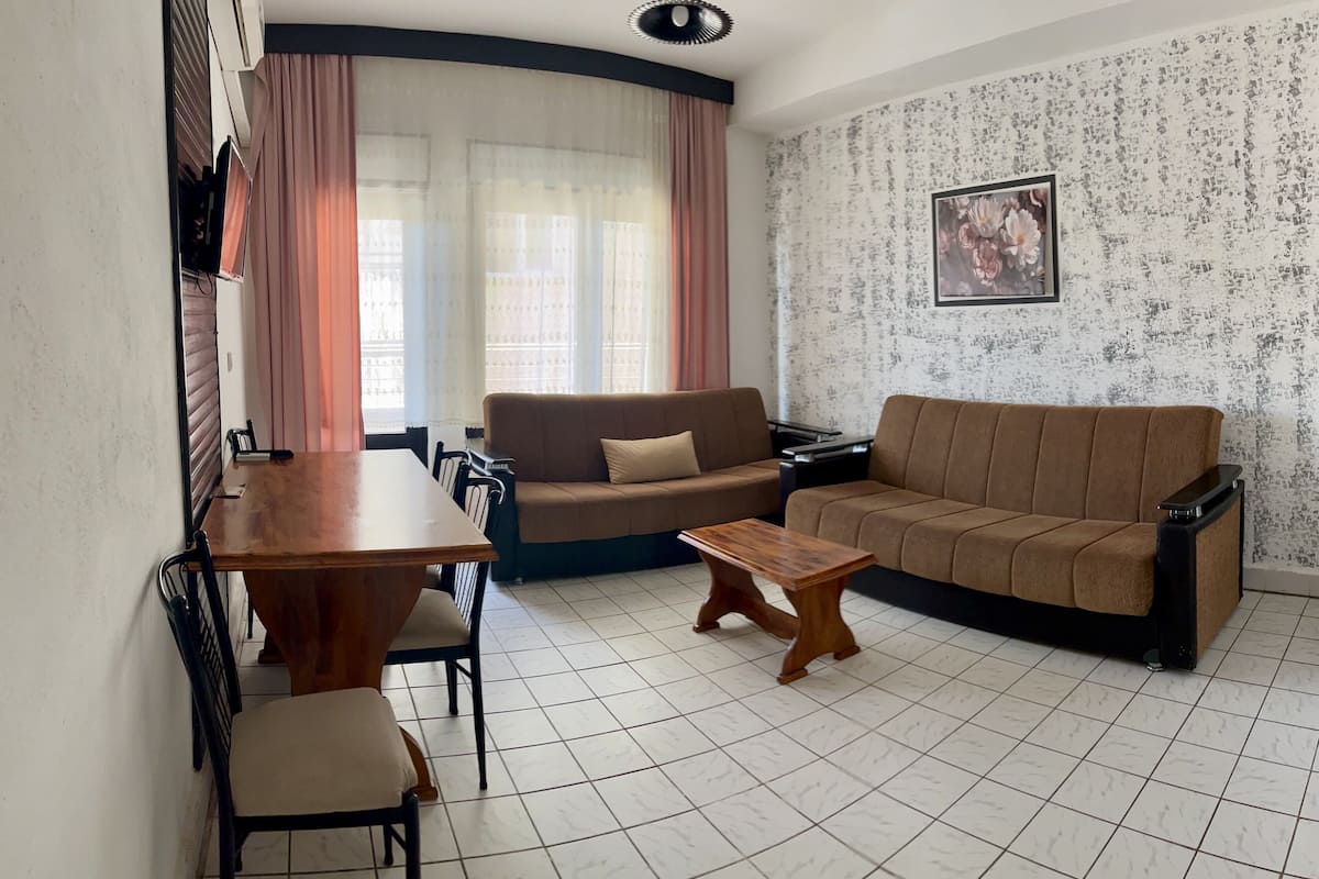 Family Apartment, 1 Bedroom | Living area | TV