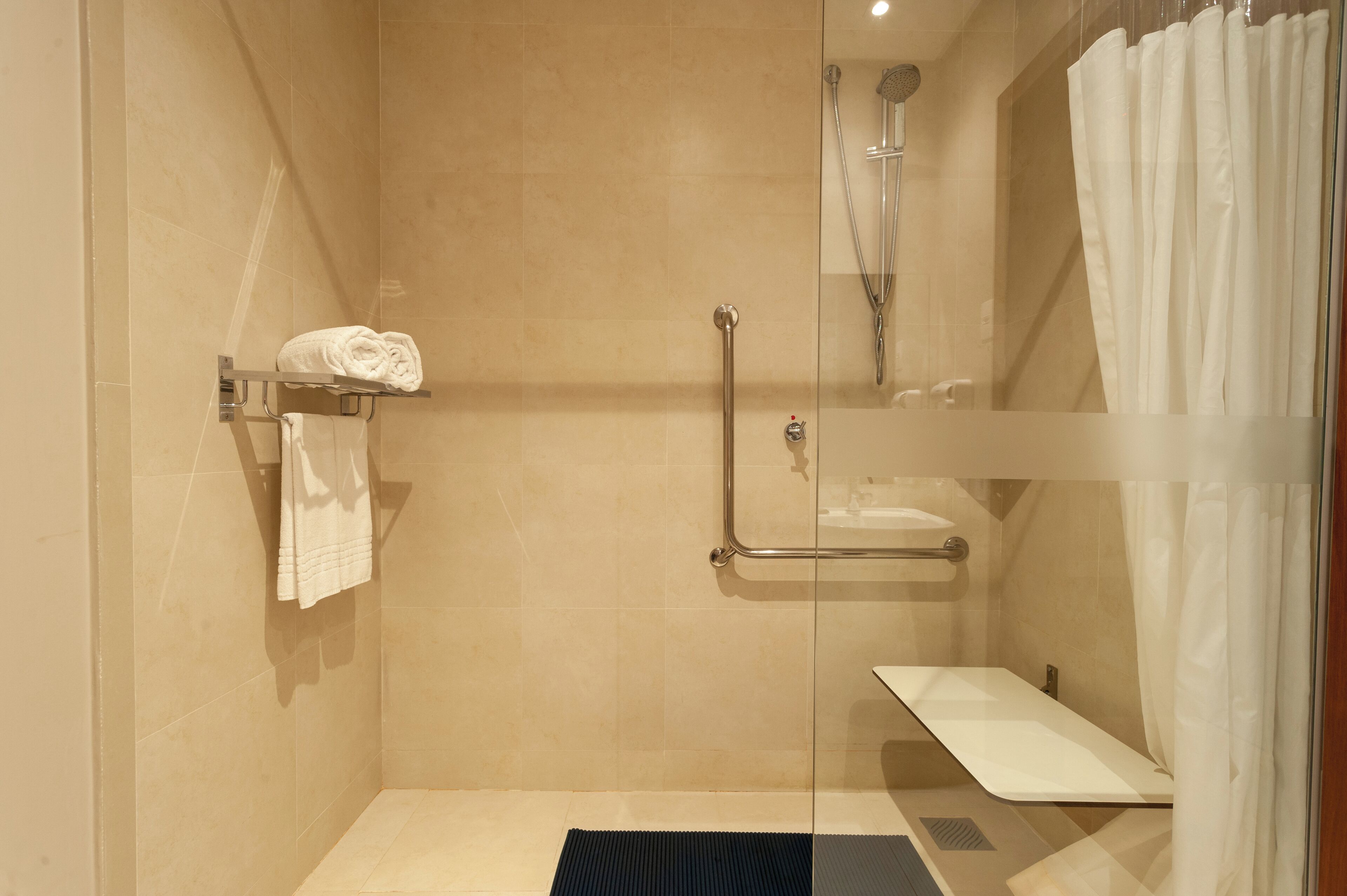 Superior King Handicapped | Bathroom | Designer toiletries, hair dryer, towels, soap