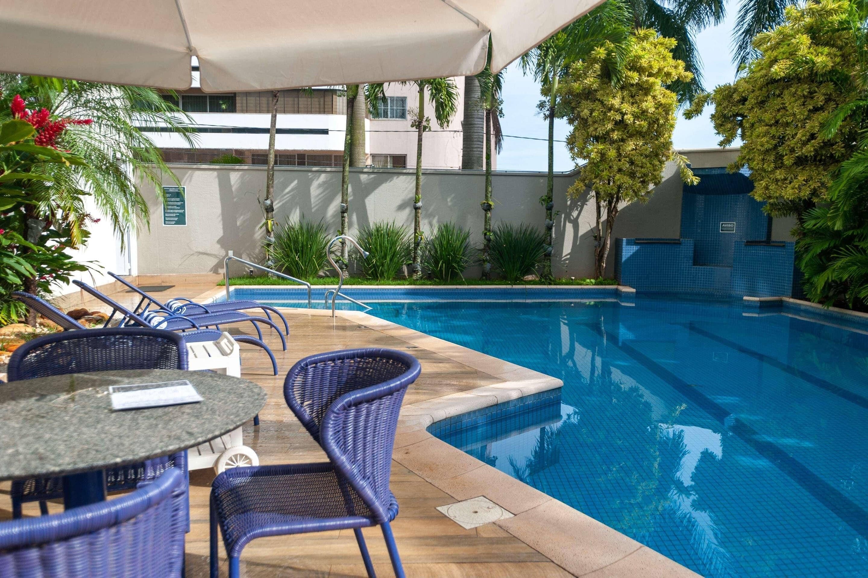 Outdoor pool, open 9:00 AM to 9:00 PM, pool umbrellas, sun loungers