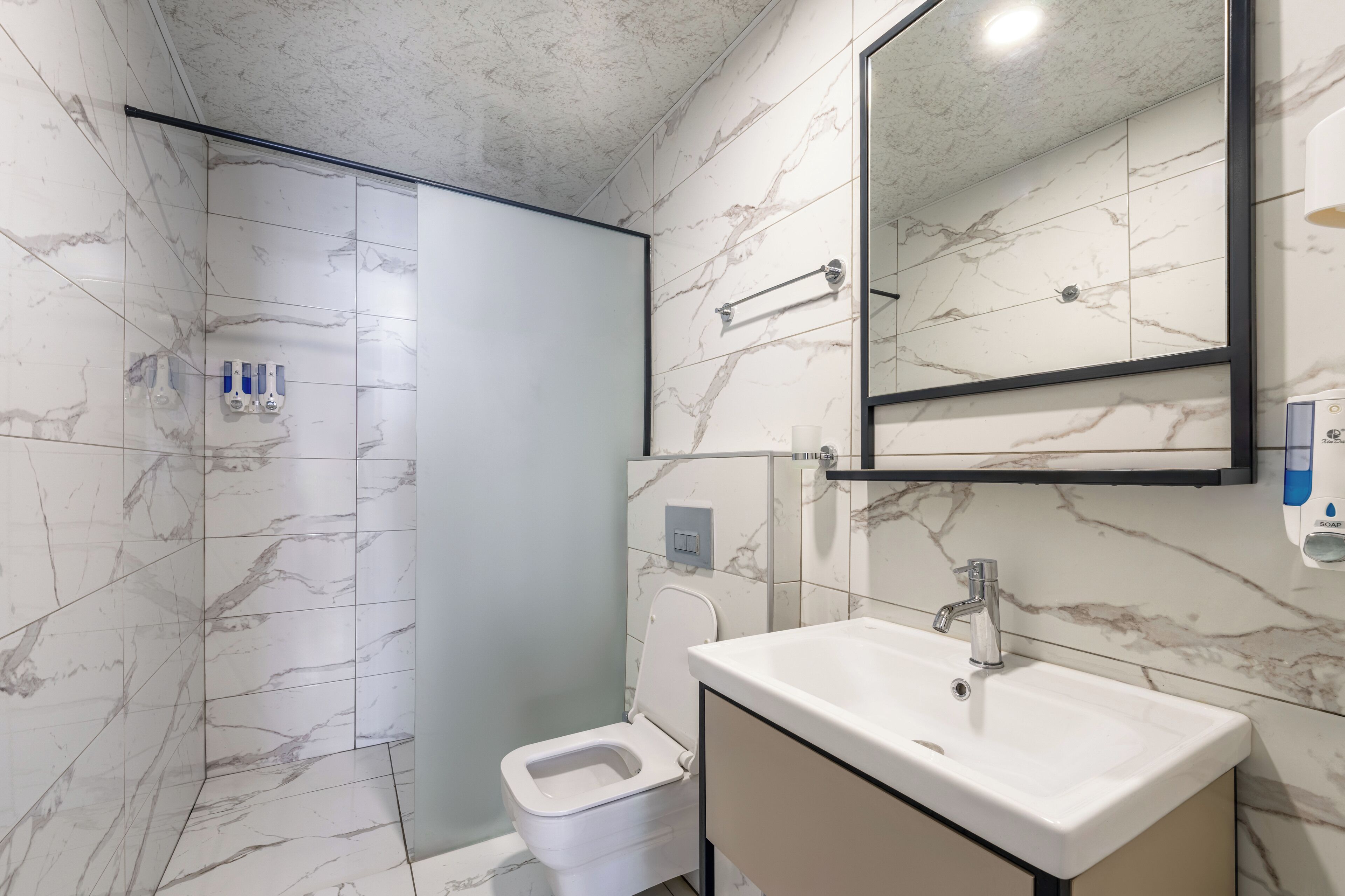 standard triple room | bathroom | shower, rainfall showerhead, eco-friendly toiletries, hair dryer